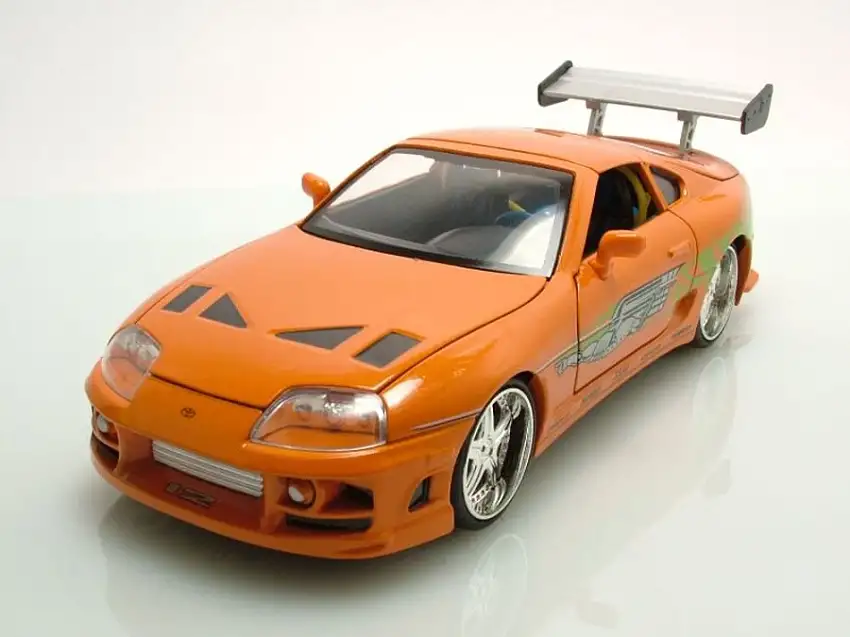 Toyota Supra 1995 orange Fast & Furious mit Brian Figur Modellauto 1:24 Jada Toys